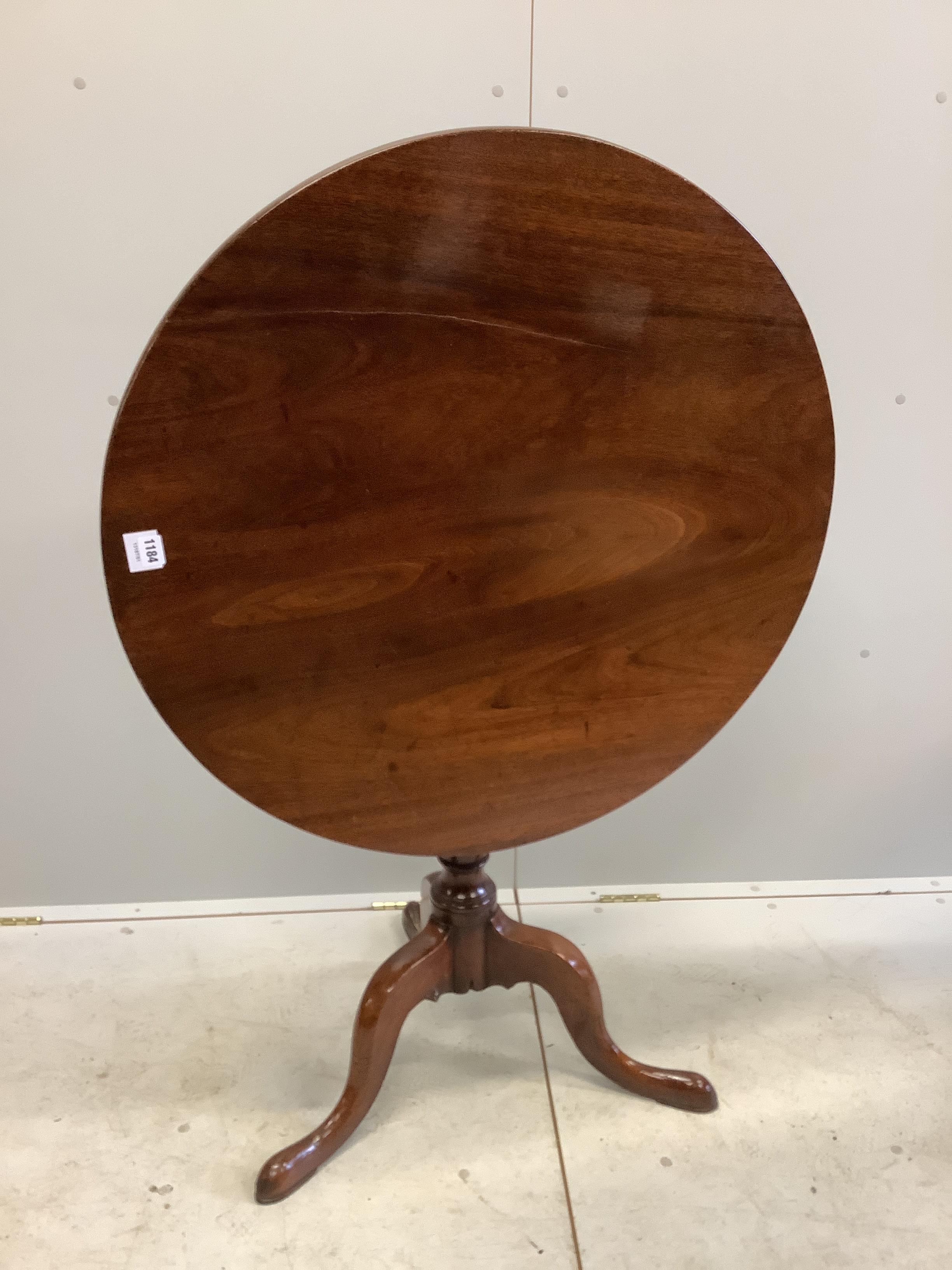 A George III mahogany tilt top tripod tea table, diameter 82cm, height 77cm